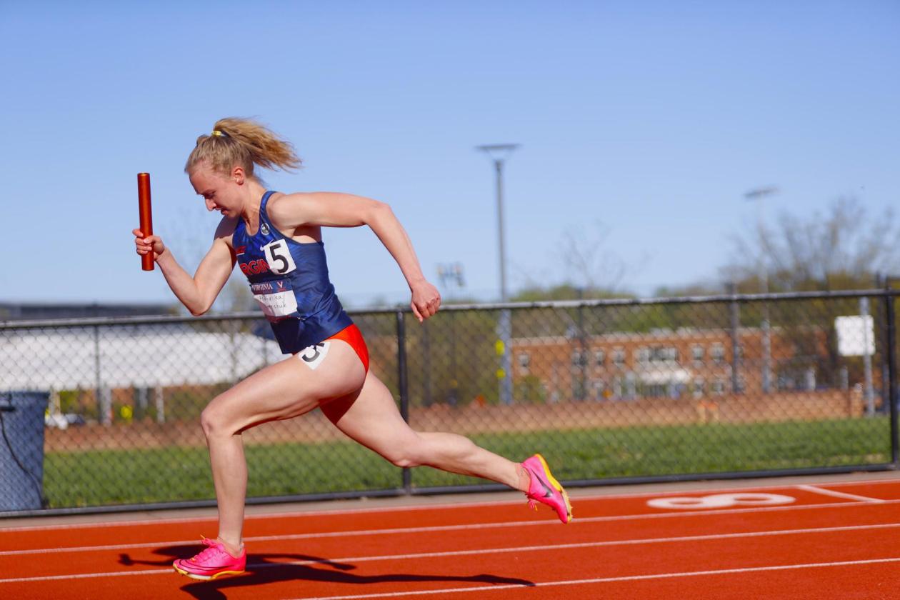 UVA Student running on a track