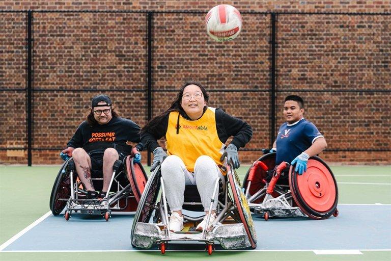 The people playing wheelchair basketball