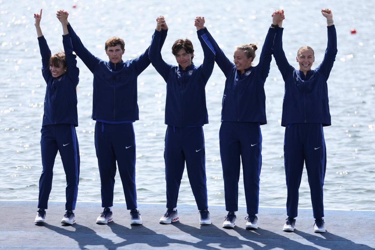 UVA rower Skylar Dahl, far right, celebrates with her U.S. crew after earning a silver medal at the Paralympics on Sunday in Paris. (Photo by Naomi Baker, Getty Images)